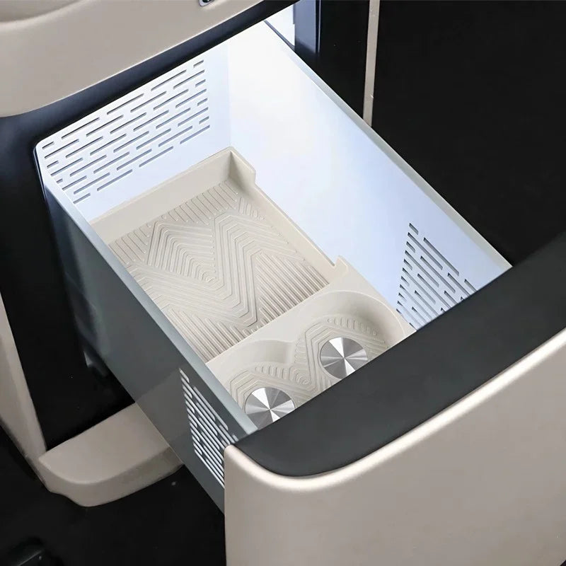Cream white patterned silicone center console organizer tray for BYD car interior storage.