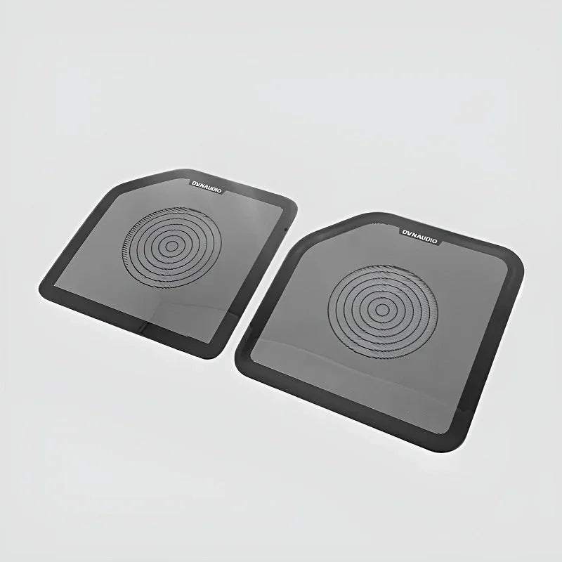 Pair of premium grey Dynaudio car speaker covers with a sleek matte finish.
