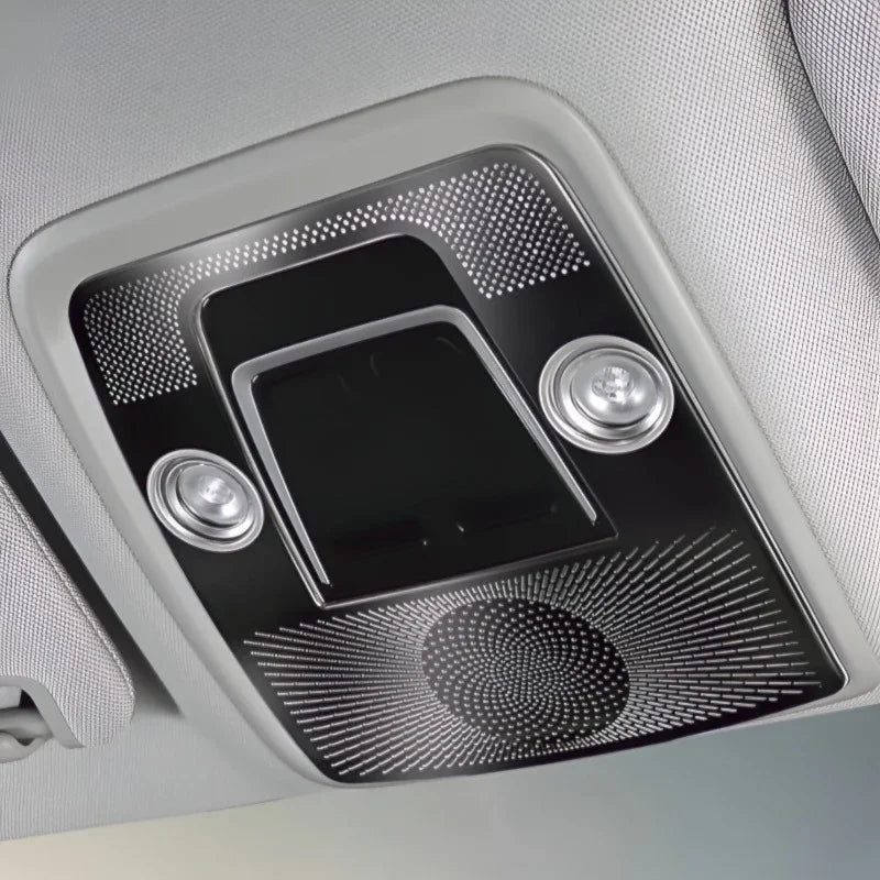 Black and silver patterned interior overhead console with integrated LED lights.