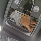 Polished chrome interior trim panel with a decorative perforated dot pattern for BYD vehicles.