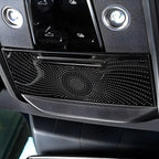 Black textured overhead console with integrated LED lights and glossy control panel.