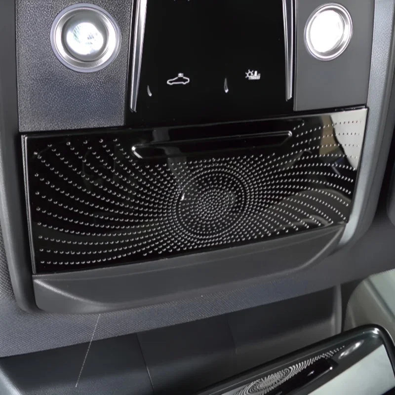 Glossy black patterned interior trim panel for BYD vehicle ceiling console.