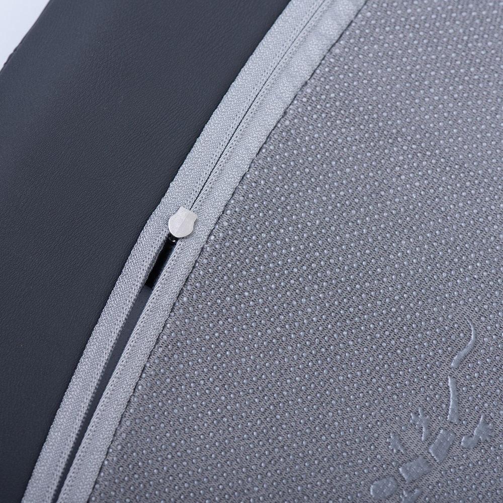 Close-up of a grey textured fabric car accessory featuring a durable silver zipper detail.