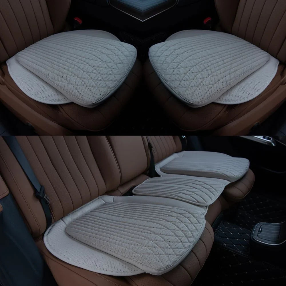 Cream white quilted leather car seat cushions for BYD, featuring breathable perforated texture.
