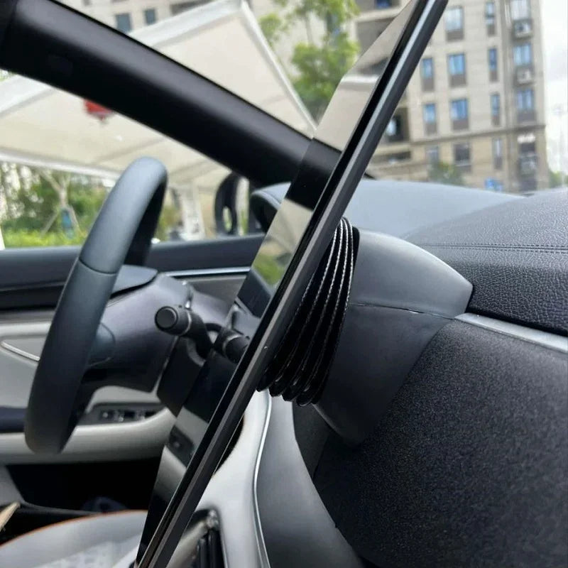 Black leather-wrapped center console trim for BYD interior with detailed stitching.
