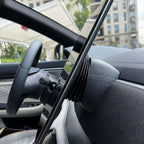Black leather-wrapped center console trim for BYD interior with detailed stitching.