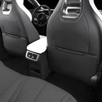 Black and white premium leather car seat covers with ergonomic design and sleek texture.