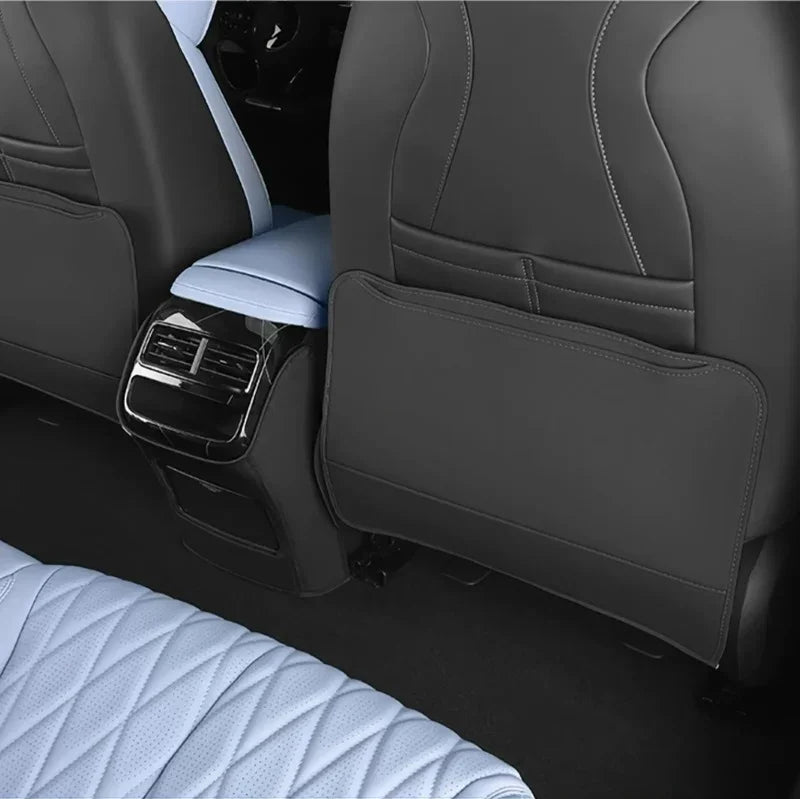 Luxury grey and light blue leather car seat covers with diamond stitching and storage pocket.