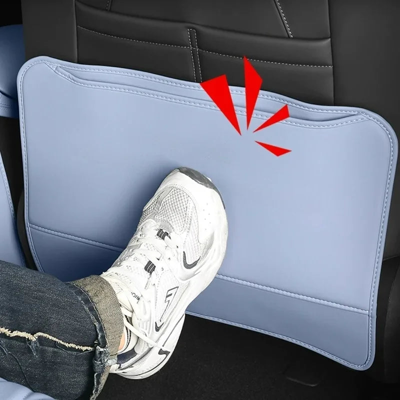 Light blue leather car seat back kick protector shielding against shoe scuffs