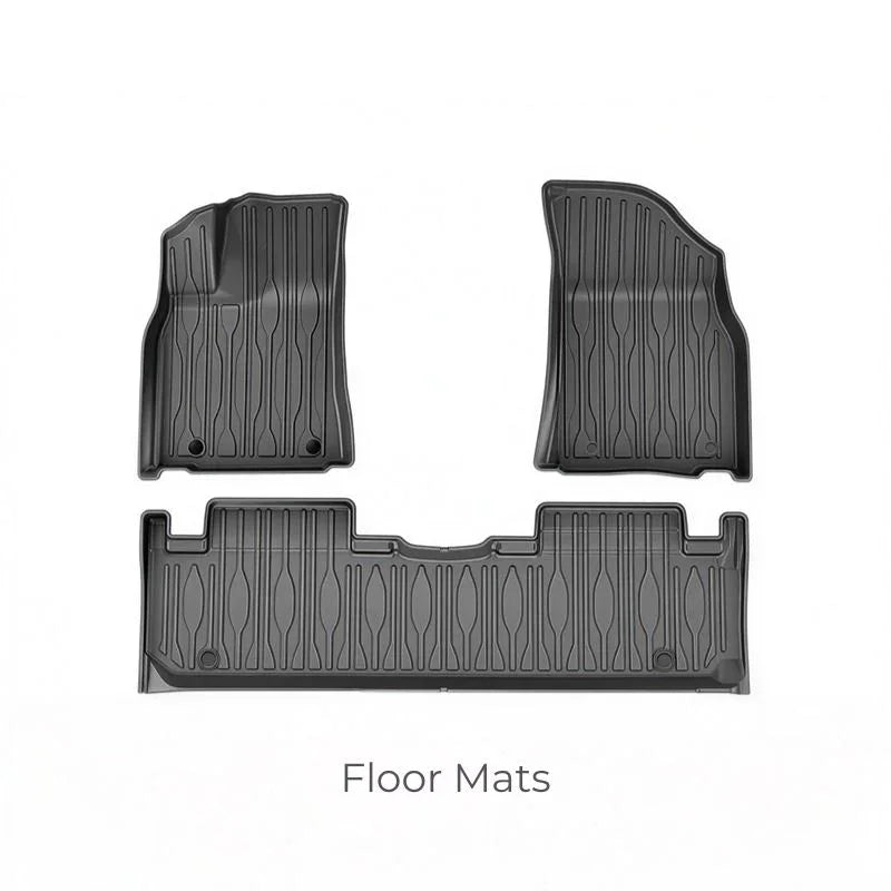 Set of durable black rubber floor mats designed for custom car protection.