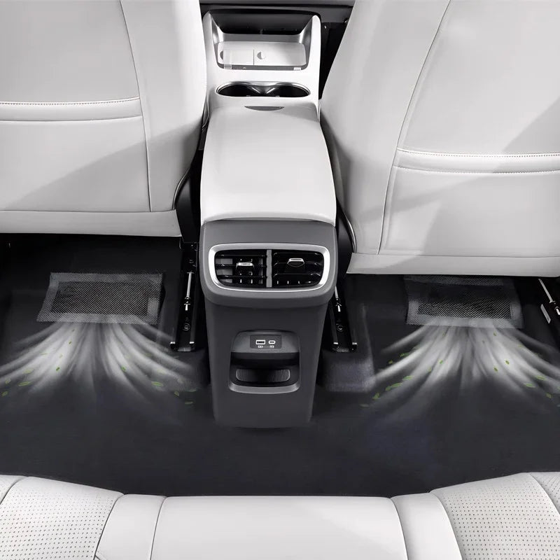 Black custom-fit car floor mats with integrated air vent airflow design for BYD interior protection.