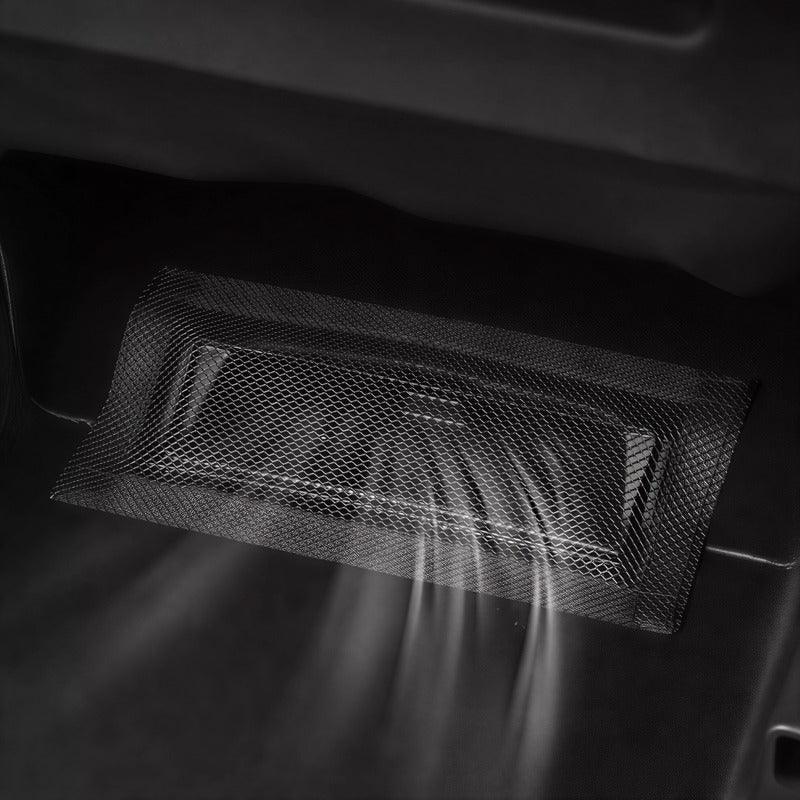 Black mesh protective cover for car trunk storage compartment, featuring a durable fine-weave design.