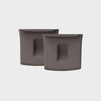 Two grey matte-finish car interior accessories with recessed grip detailing.