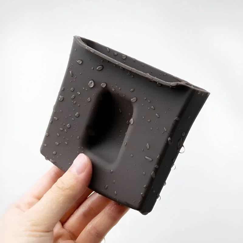 Waterproof brown silicone car accessory with water droplets, showcasing durable material.