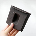 Waterproof brown silicone car accessory with water droplets, showcasing durable material.