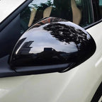Glossy black carbon fiber texture side mirror cover for BYD vehicles.