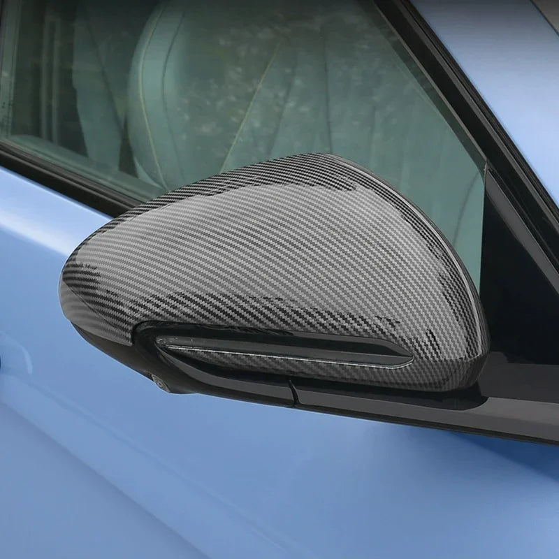 Carbon fiber texture side mirror cover in sleek black for BYD vehicle protection.