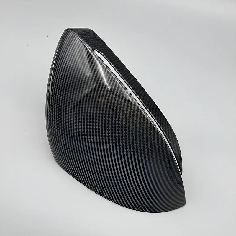 Glossy black carbon fiber patterned car side mirror cover accessory.