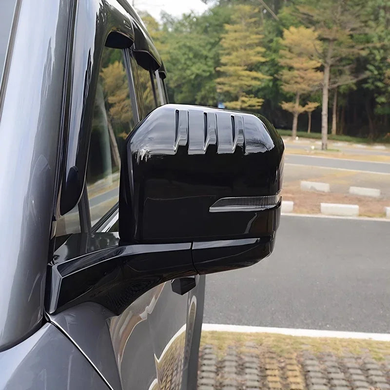 Glossy black ABS plastic side mirror cover for BYD car with integrated LED turn signal light