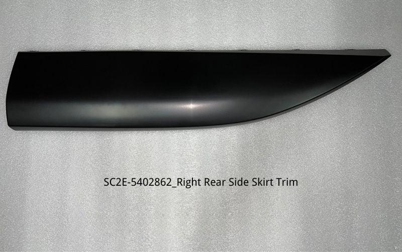 Matte black right rear side skirt trim made of durable automotive-grade material.