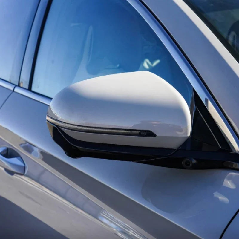 Sleek silver metallic mirror cover for BYD vehicle with integrated LED indicator