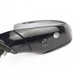 Glossy black side mirror cover with integrated indicator light and sensor