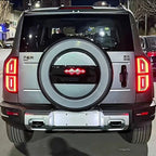 Rear view of a silver BYD Fangchengbao Bao 5 SUV featuring a distinctive circular spare tire cover.