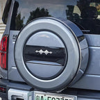 Grey hard-shell spare tire cover with sleek black center accent for BYD off-road protection.