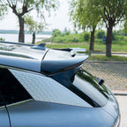 Sleek black aerodynamic rear spoiler installed on a grey BYD SUV, featuring a high-gloss finish.