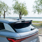 Sleek black aerodynamic rear spoiler installed on a grey BYD SUV for enhanced styling.