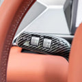 Carbon fiber texture steering wheel control panel in glossy black finish