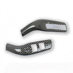 Pair of carbon fiber texture gear shift and control panel covers in black and grey.