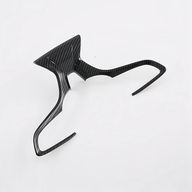 Black carbon fiber patterned interior trim accessory for BYD car door handles.