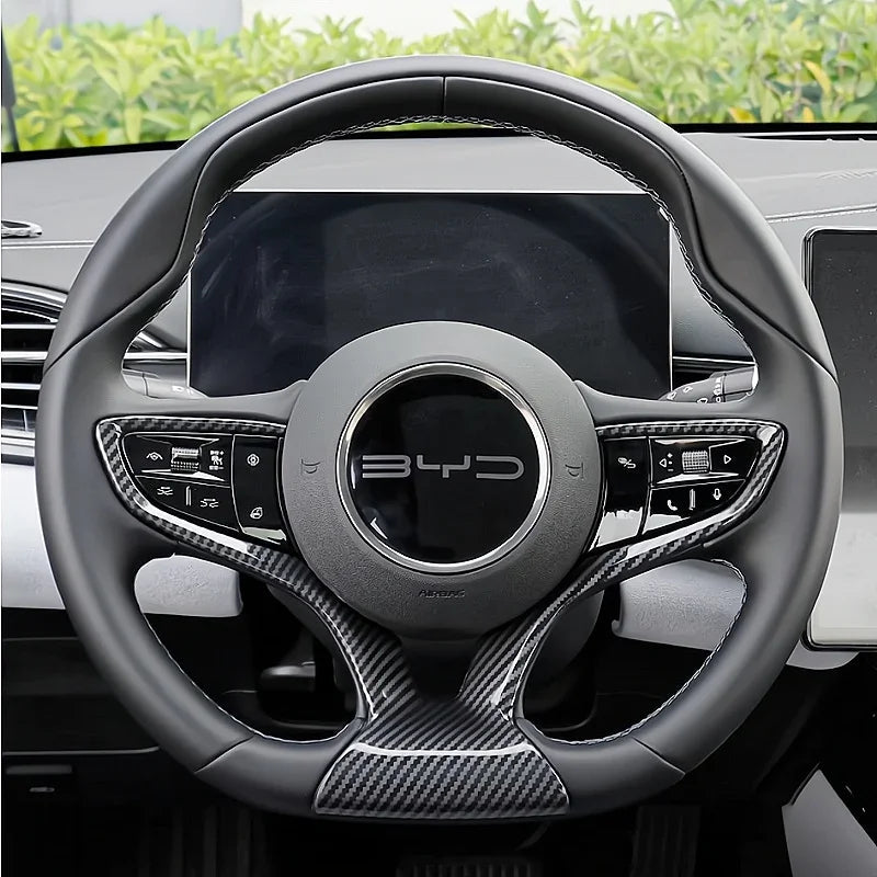 Black leather and carbon fiber steering wheel for BYD with premium textured finish.