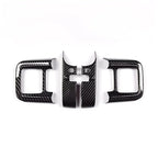 Black carbon fiber interior trim kit for BYD center console and side panels.