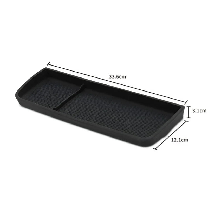 Black textured rubber car organizer tray with dimensions 33.6cm x 12.1cm x 3.1cm