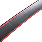 Black matte protective trim strip with distinctive red edge detailing.