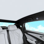 White quilted leather car seat interior with premium textured upholstery and sleek black trim.