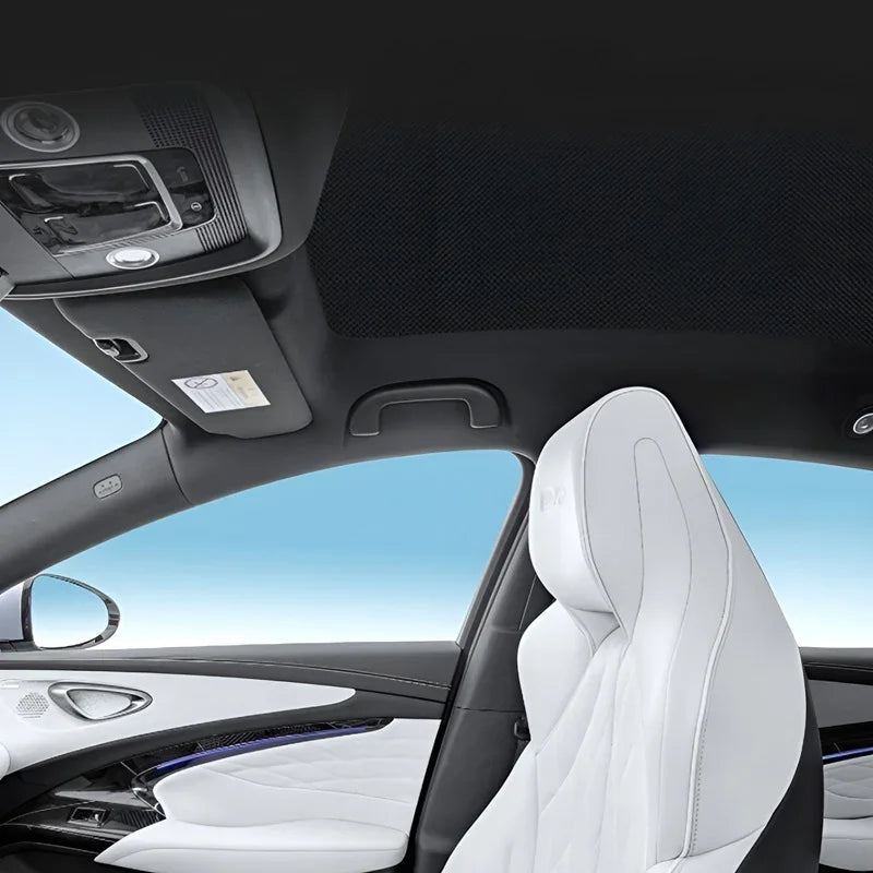 Premium white leather car seat with diamond stitching and black interior trim.