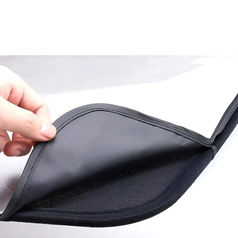 Durable black mesh storage pocket made of high-quality fabric for car interior organization.