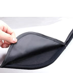 Durable black mesh storage pocket made of high-quality fabric for car interior organization.