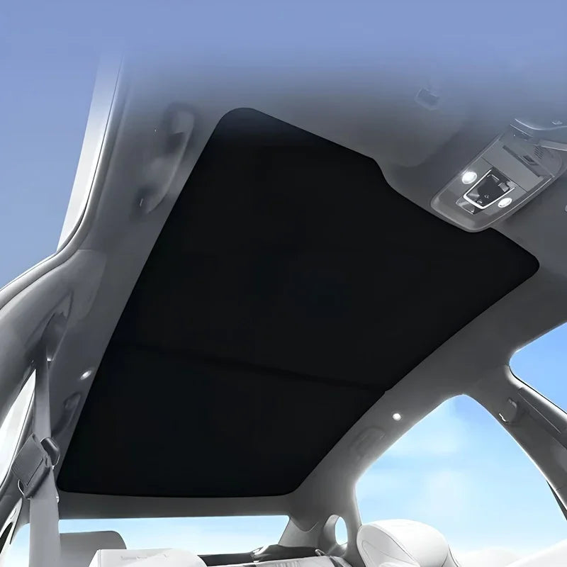 Black fabric car sunroof sunshade for BYD interior protection and heat insulation.