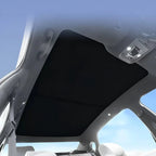 Black fabric car sunroof sunshade for BYD interior protection and heat insulation.