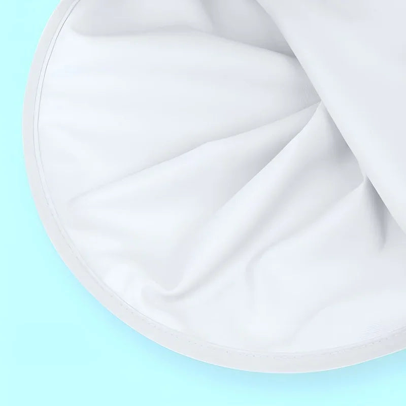 Close-up view of durable white fabric material with smooth folds and clean edges.