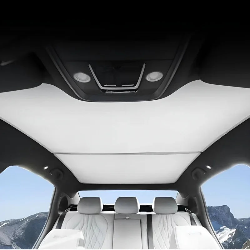 Luxury white panoramic sunroof and light grey leather interior for BYD vehicle.