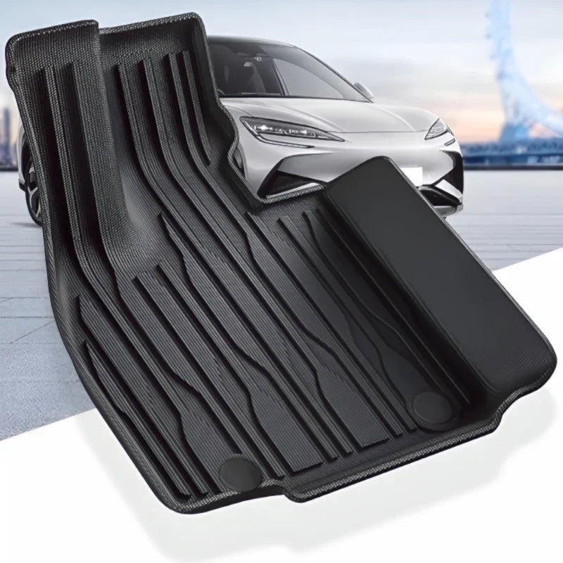 Custom-fit black TPE car floor mats with textured anti-slip surface and high-edge protection.