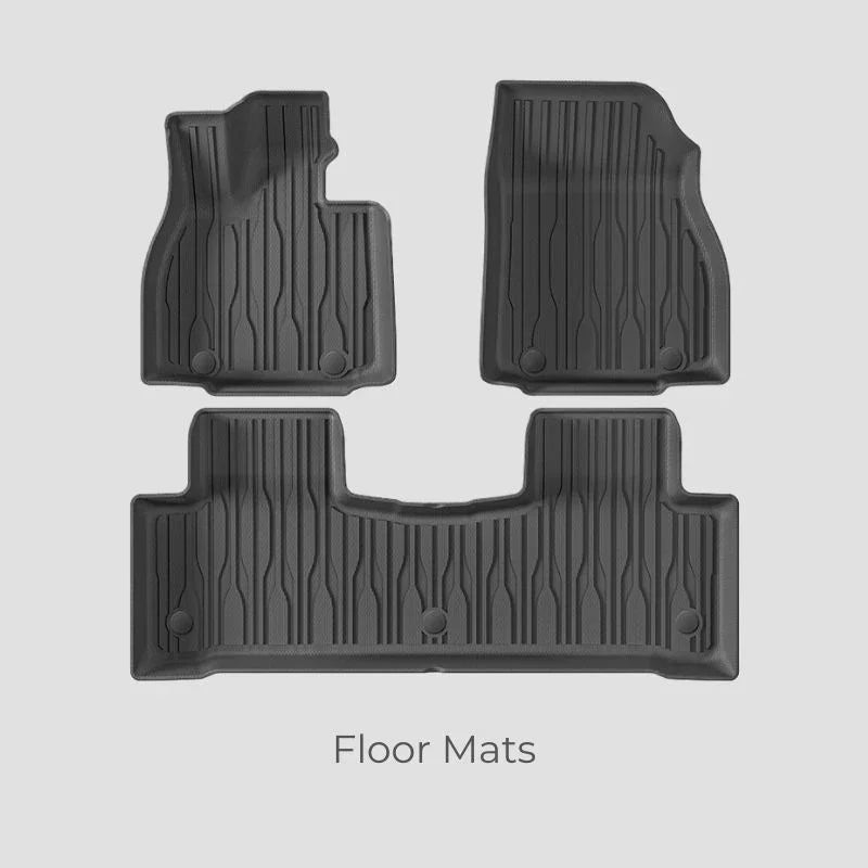 Durable black TPE custom-fit floor mats for BYD, featuring a textured anti-slip design.