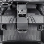 Custom-fit grey TPE waterproof car floor mats with deep grooves for interior protection.