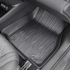 Black custom-fit all-weather rubber car floor mat with deep grooves for maximum protection.