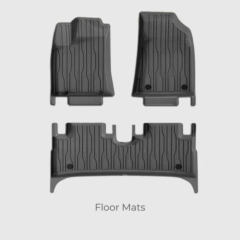 Black heavy-duty TPE rubber floor mats set for custom vehicle interior protection.